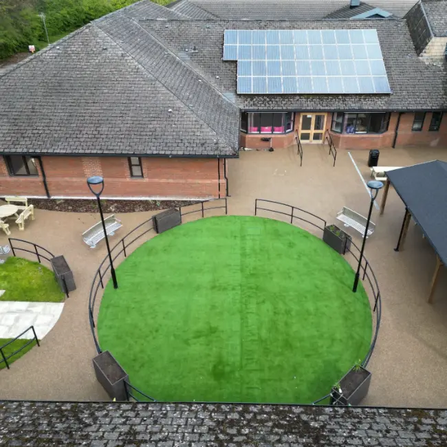 Aerial view of resin bound courtyard with circular seating area at care home