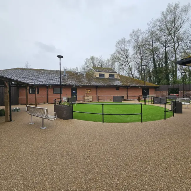 Commercial resin bound surfacing surrounding central courtyard and seating area at care home