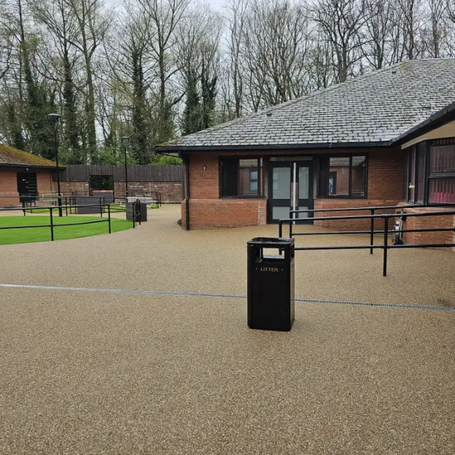 Resin bound surfacing at care home entrance with accessible pathways