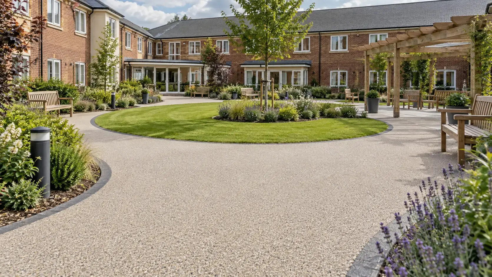 Illustrative care home courtyard with curved resin bound pathways, landscaped gardens and outdoor seating.